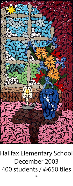 pottery mosaic of a table with candle and vase of flowers